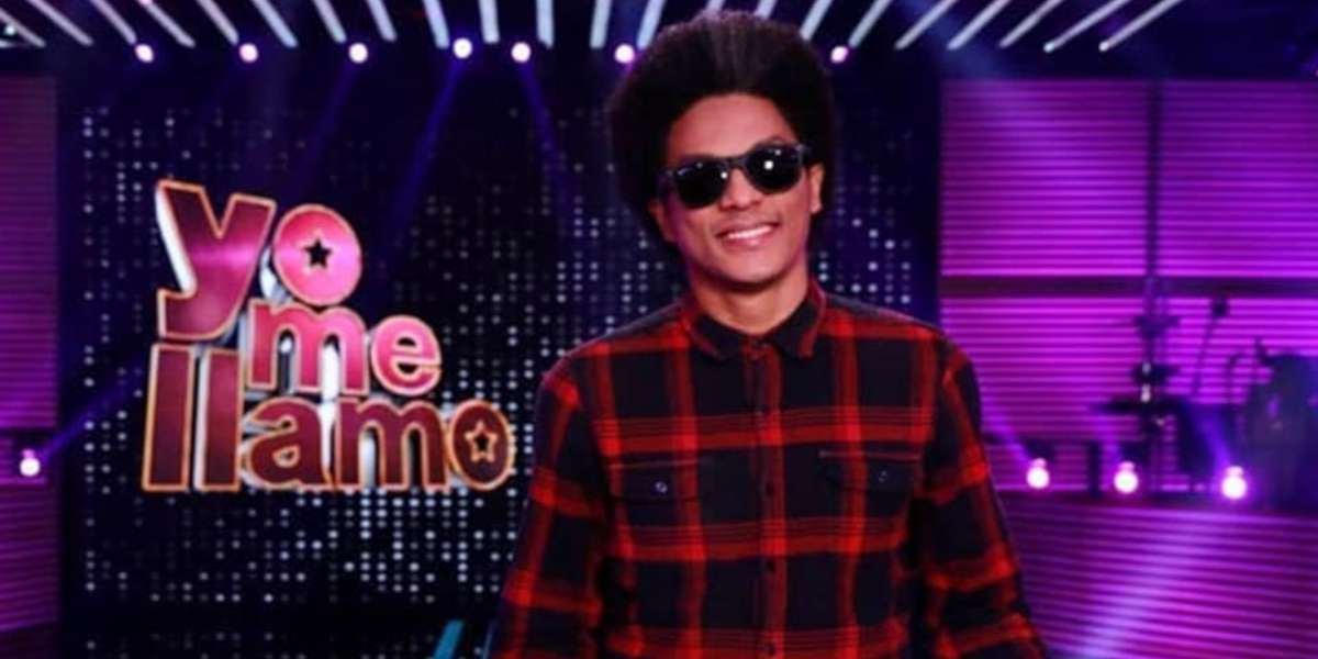 El imitador del cantante estadounidense, mantiene a su familia a punta de 'postres y canciones'